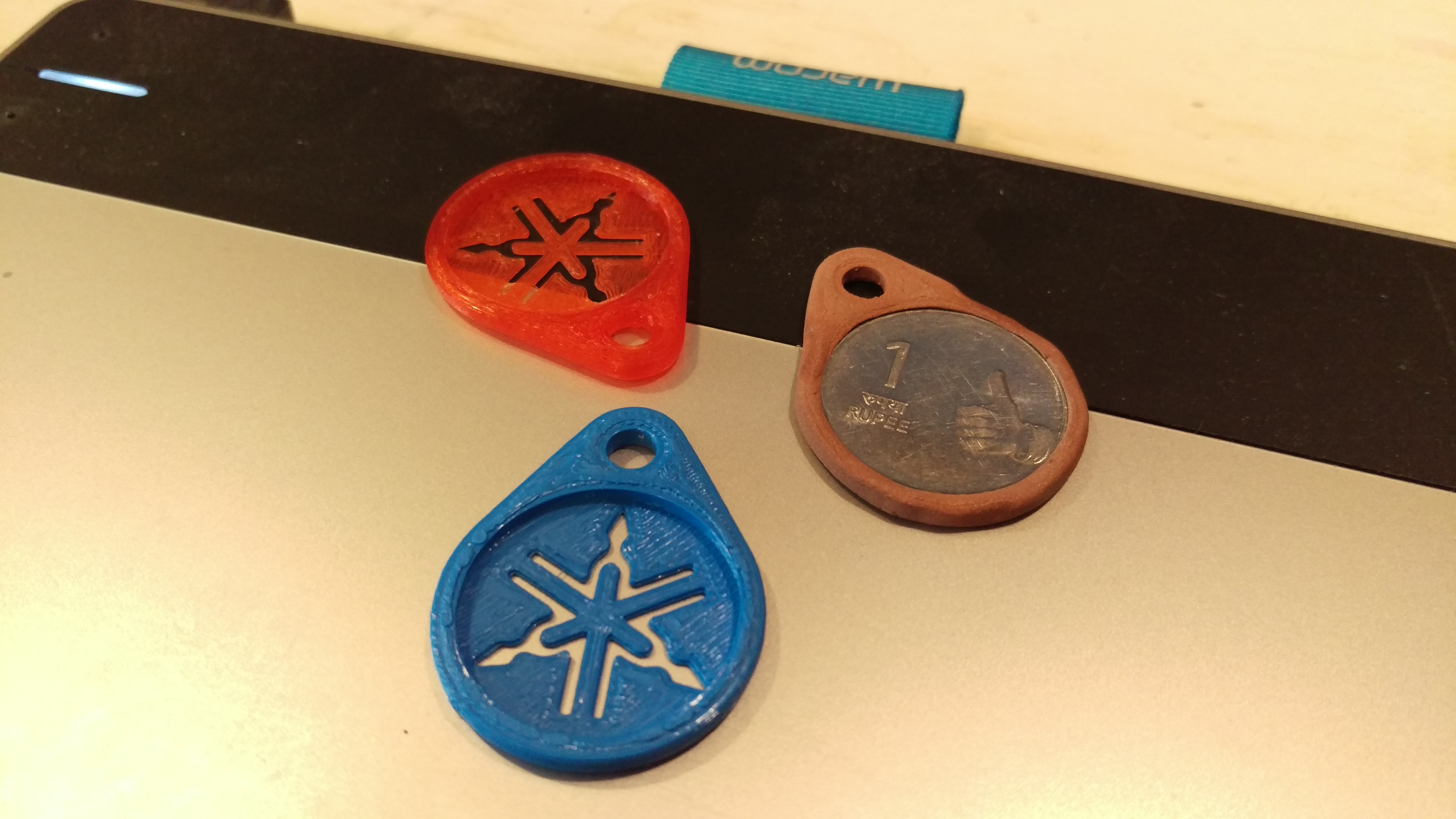 1 Rupee Yamaha keychain