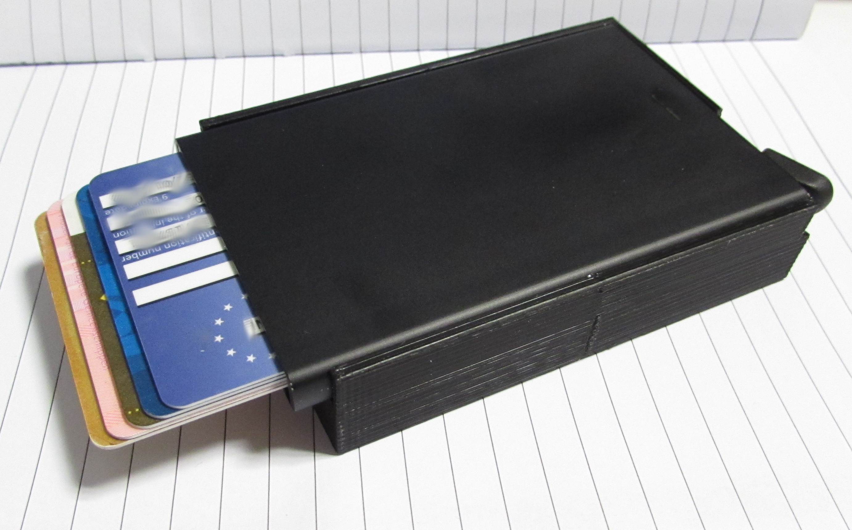 Secrid money box, sliding, no rubber band required