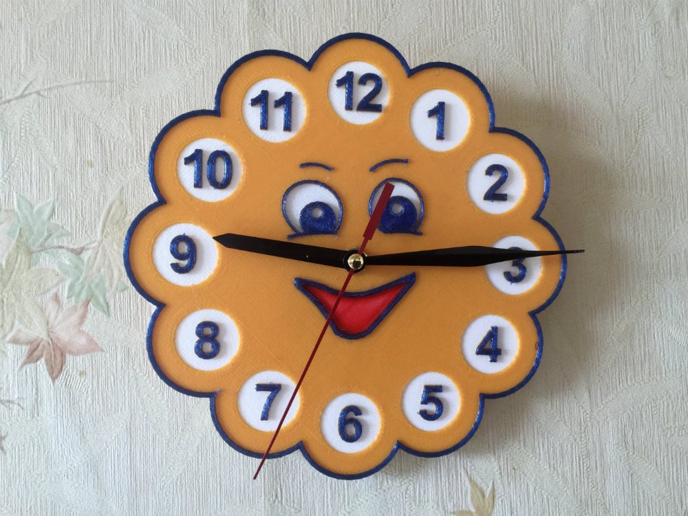 Wall clock in the children's room "Sun"