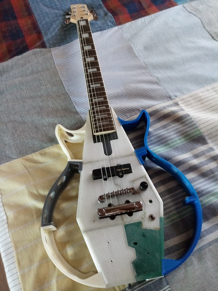 "Coffin bass" converted to an electric guitar