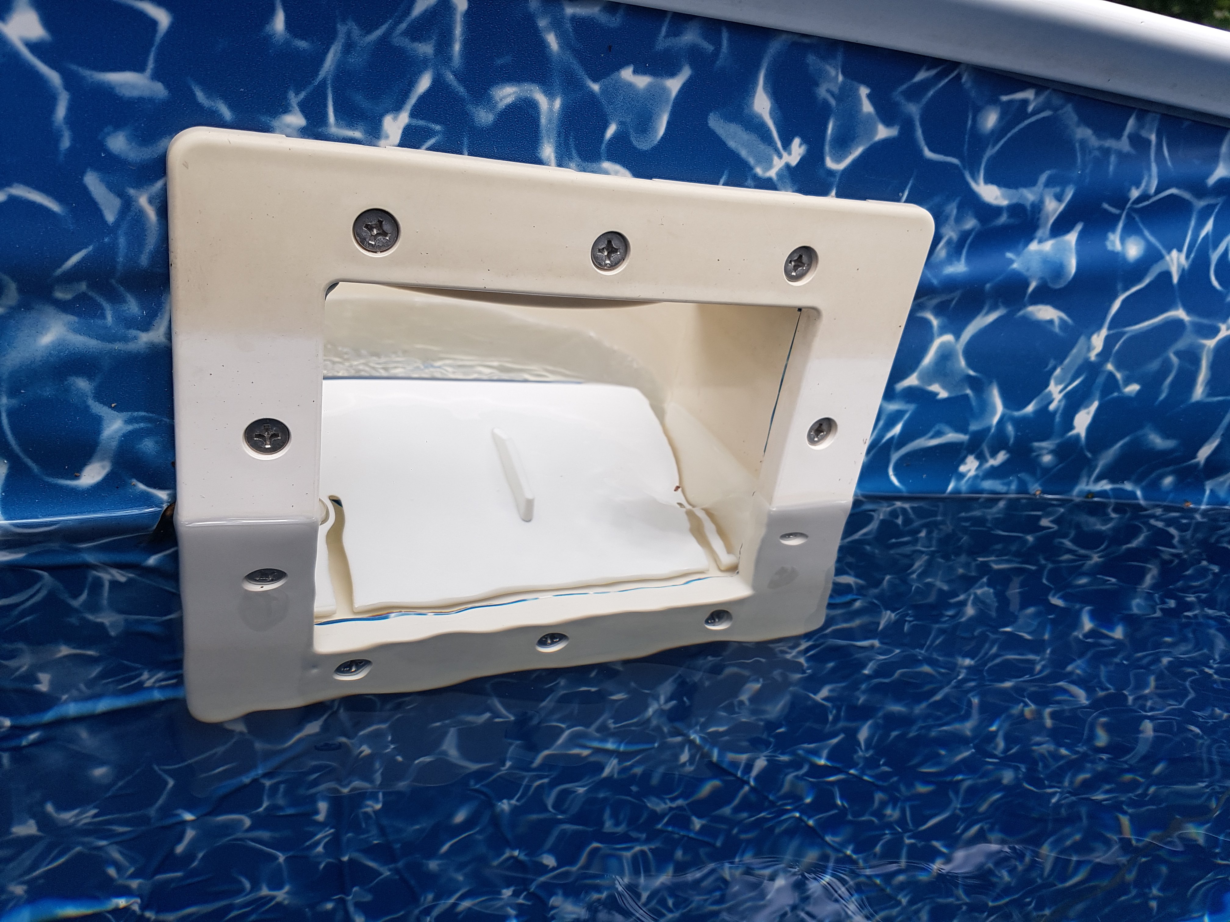 Pool skimmer door