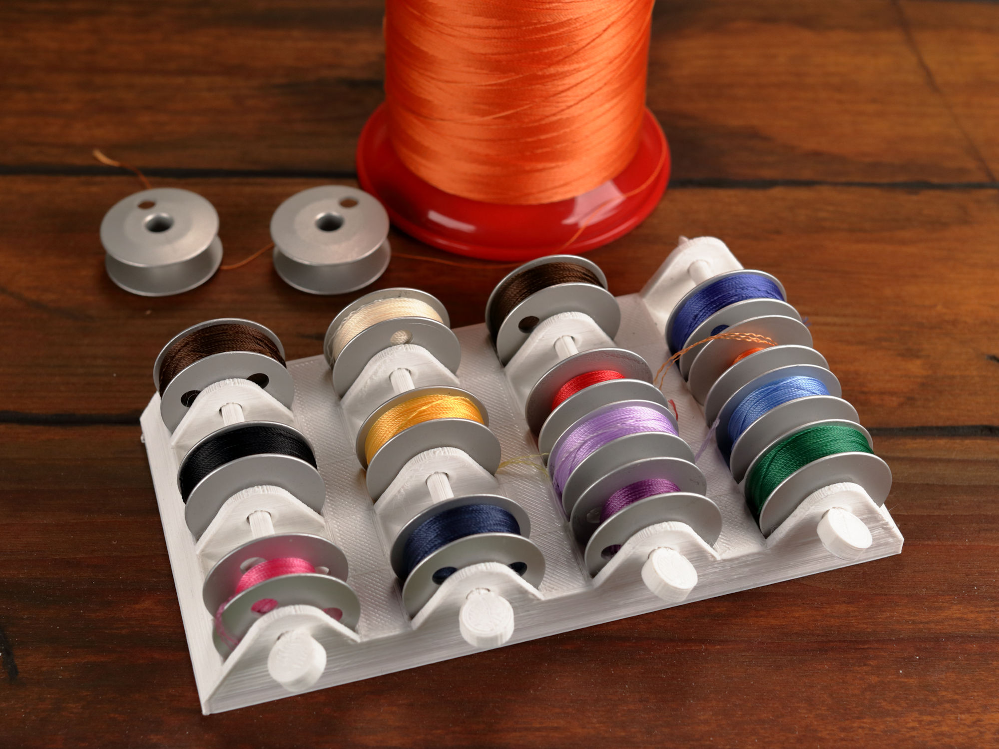 Industrial sewing machine bobbin holder