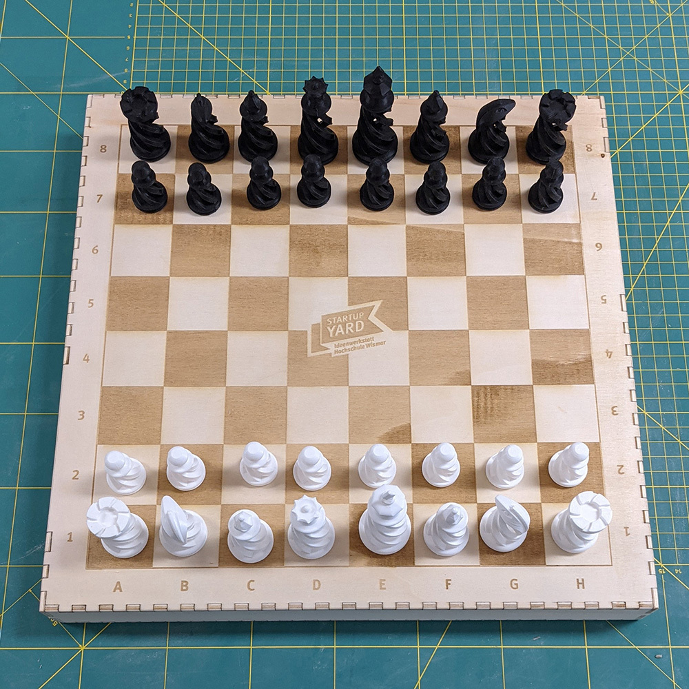 minimalistic chess board with storage boxes