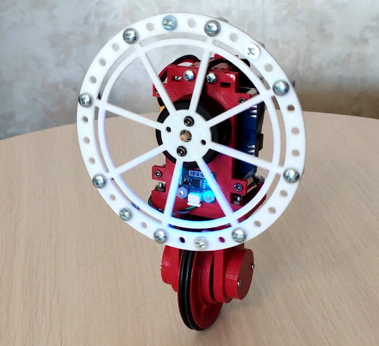 Unicycle balancing robot with reaction wheel