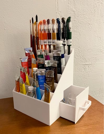 Paint tube holder with pen and brush holders