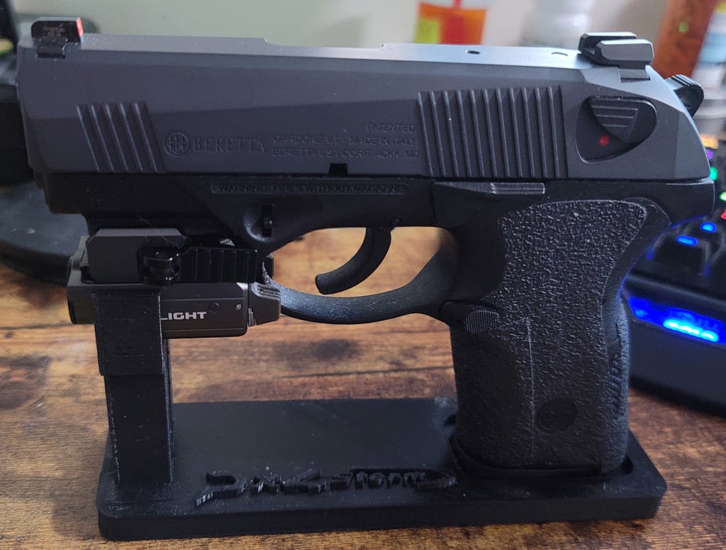 PX4 Storm stand for real handgun with PL Mini 2 tactical light attachment.