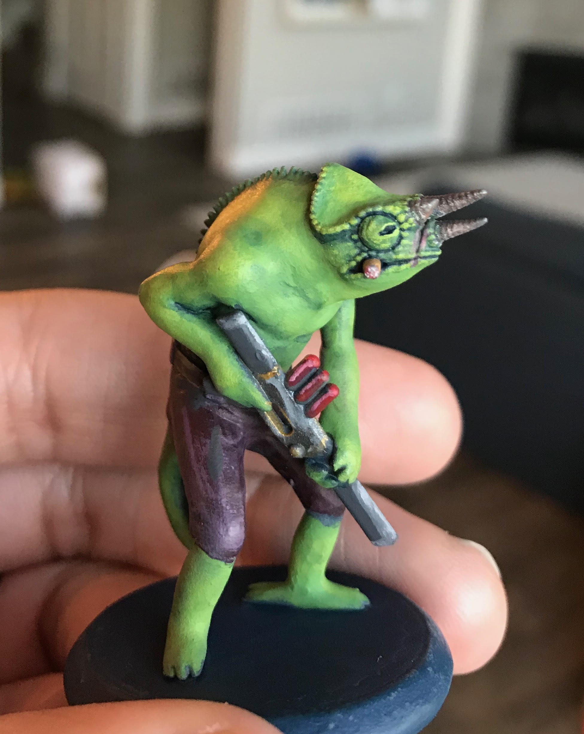 chameleon with gun