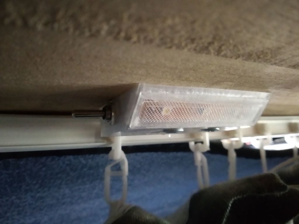 Small under cabinet reading lamp for camper