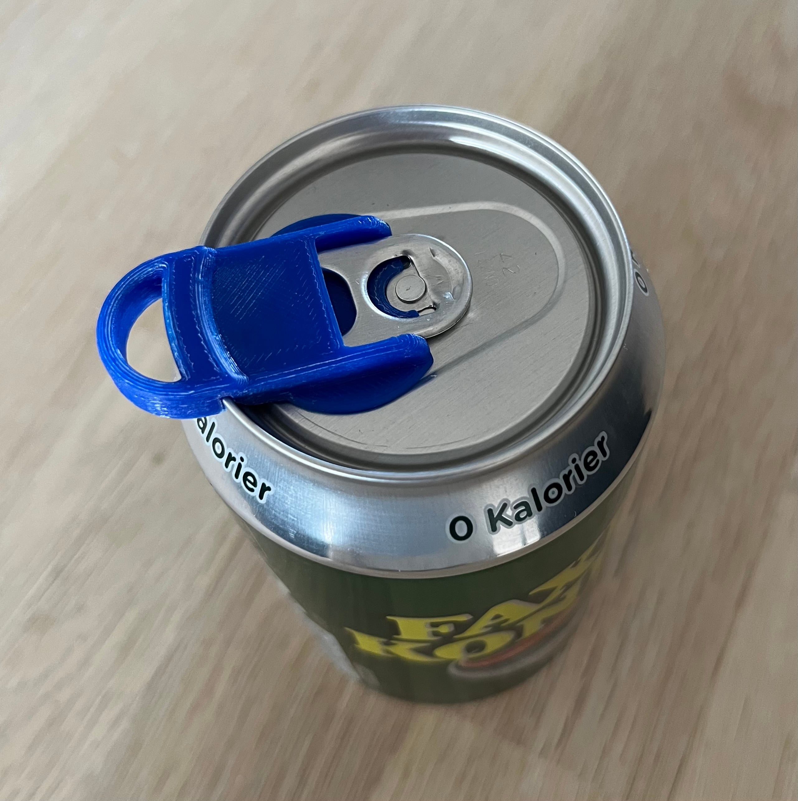 Lid for beverage cans. Stays down.
