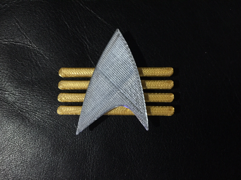 ST-TNG Future Imperfect ComBadge