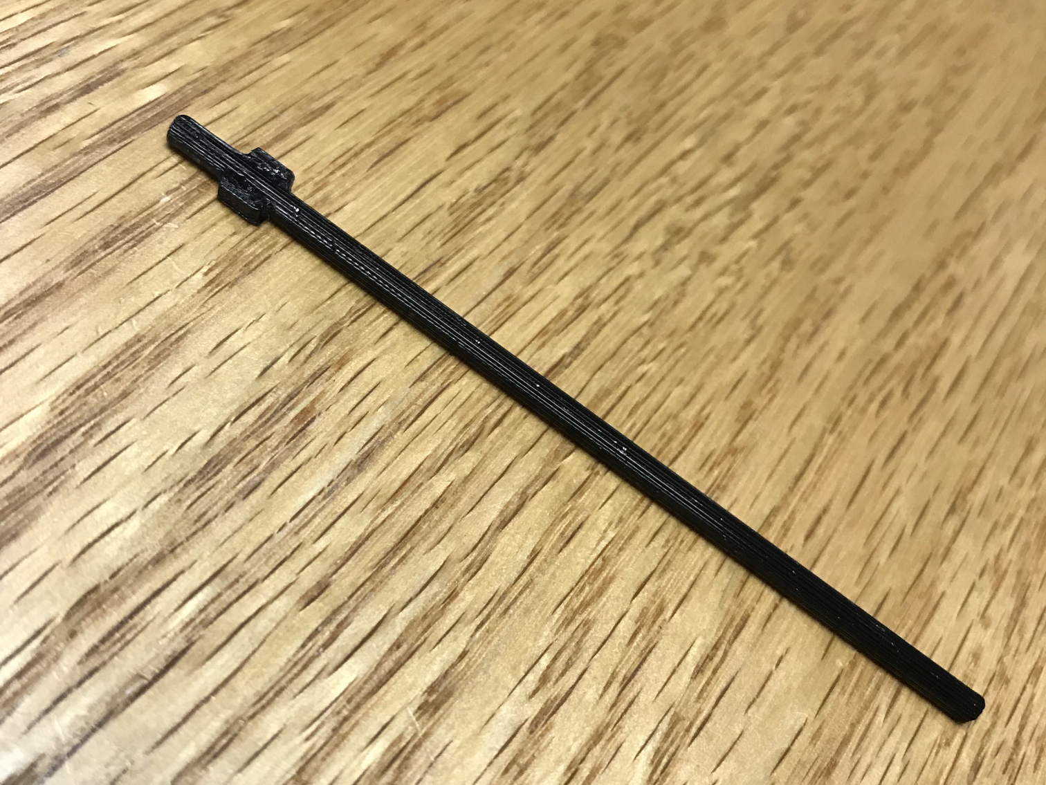 Button extension rod