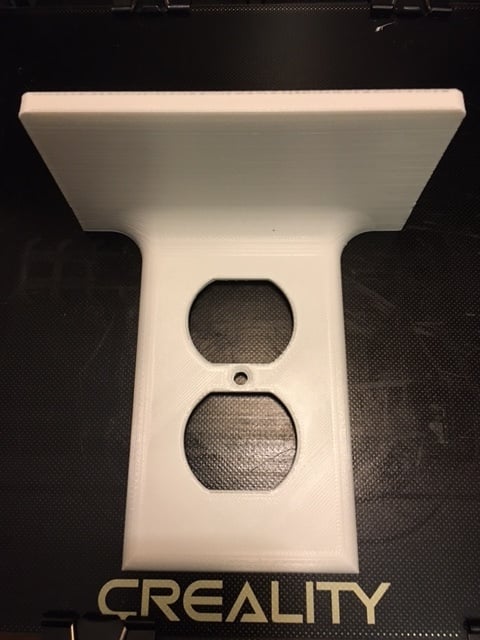 OUTLET COVER WITH SHELF