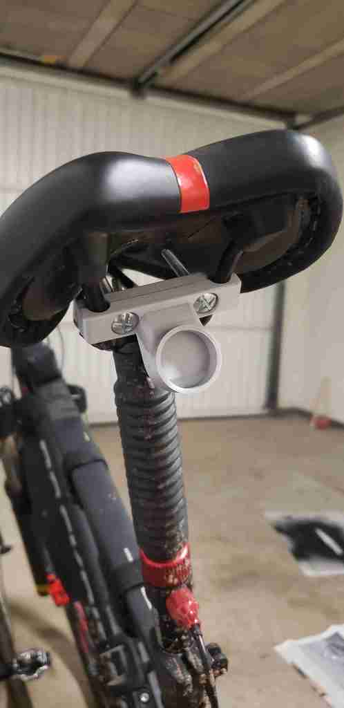 Rear light holder for bike saddle