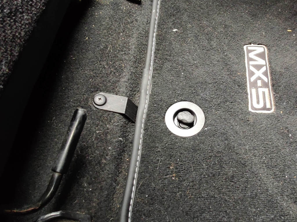 Miata driver's floor mat clip