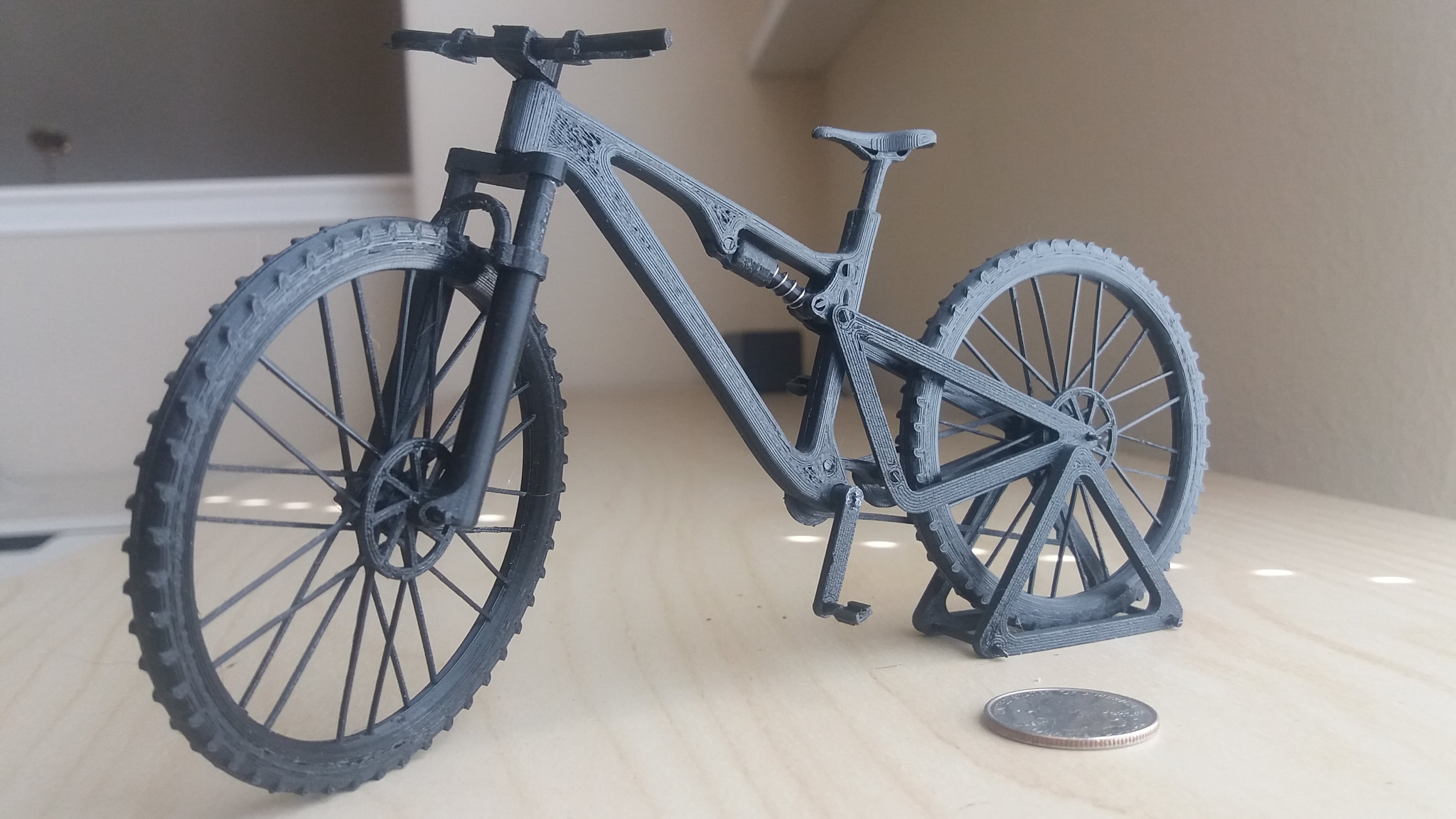 Mountain bike with articulated front and rear suspension