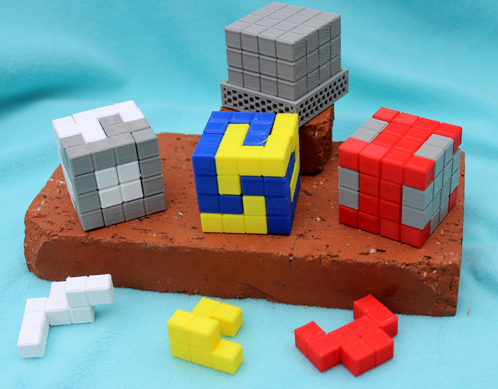 Three 3D Tiling Puzzles