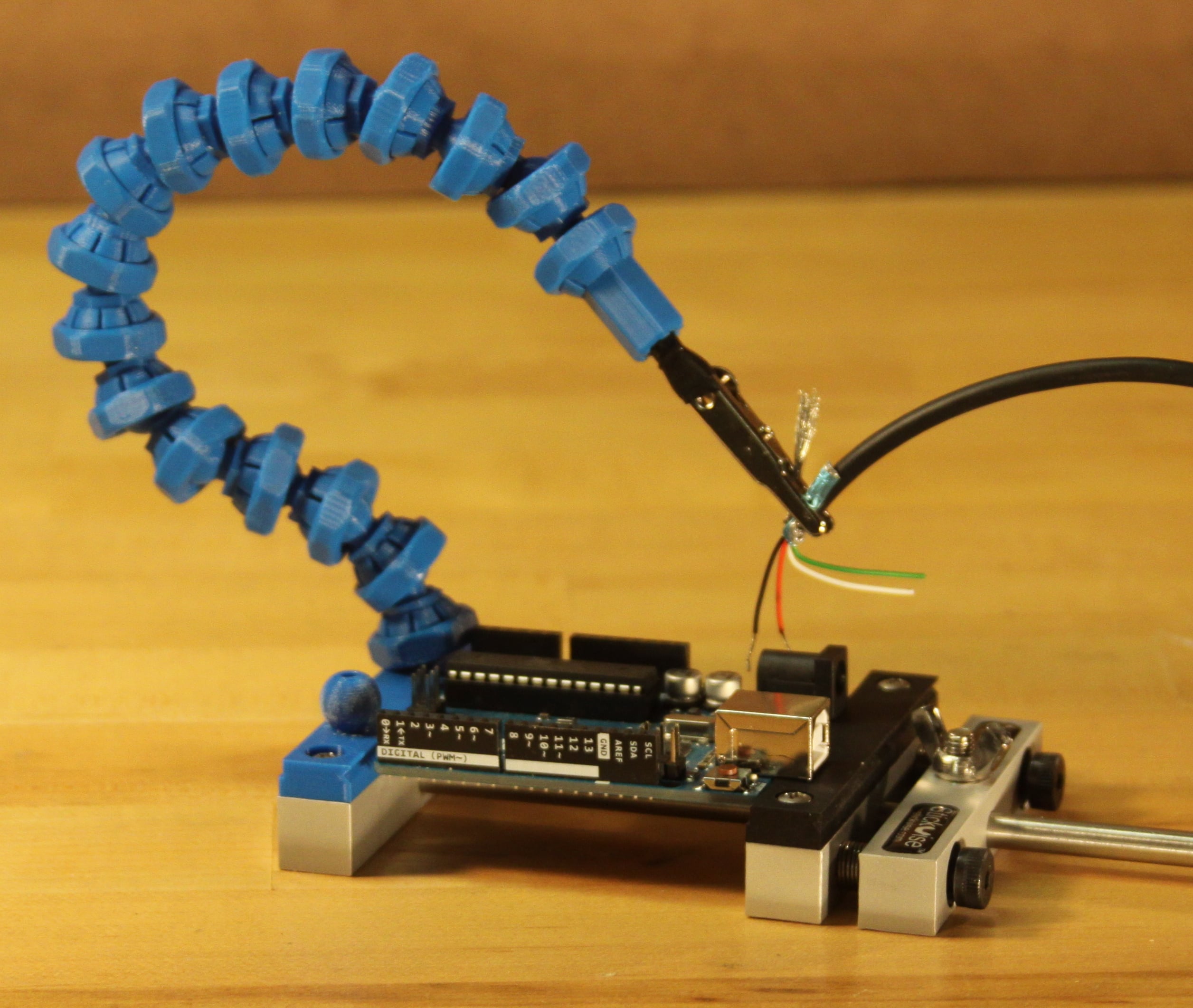Locking ball and socket arm