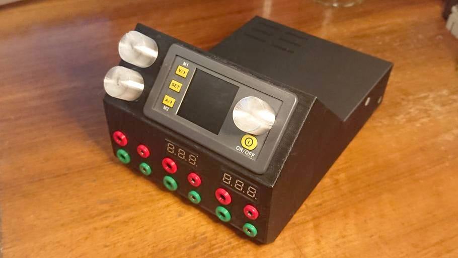 All-in-one compact AC-DC power supply with three adjustable outputs