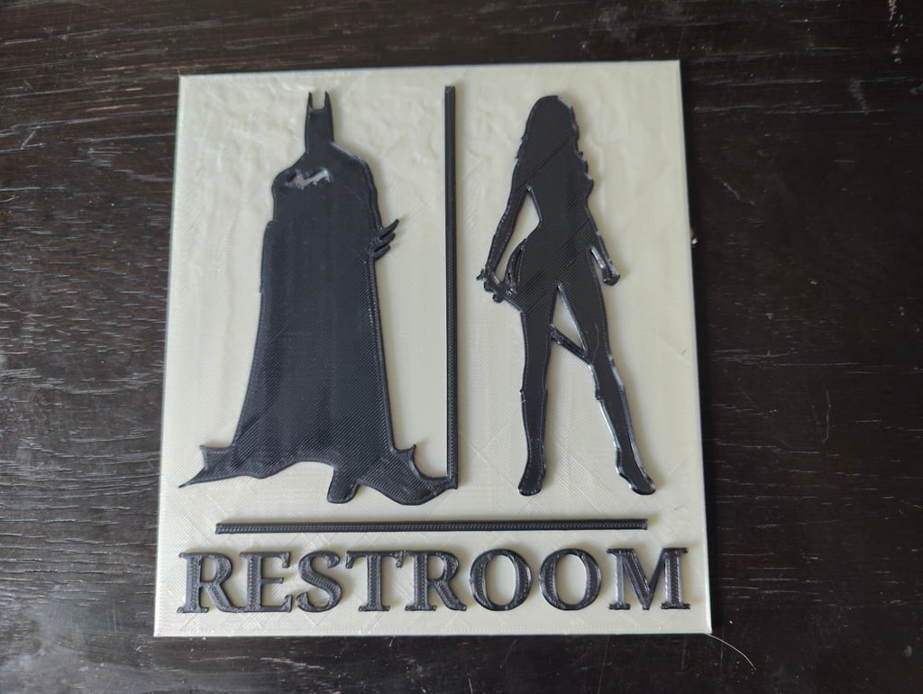 Batman Wonder Woman Restroom Sign