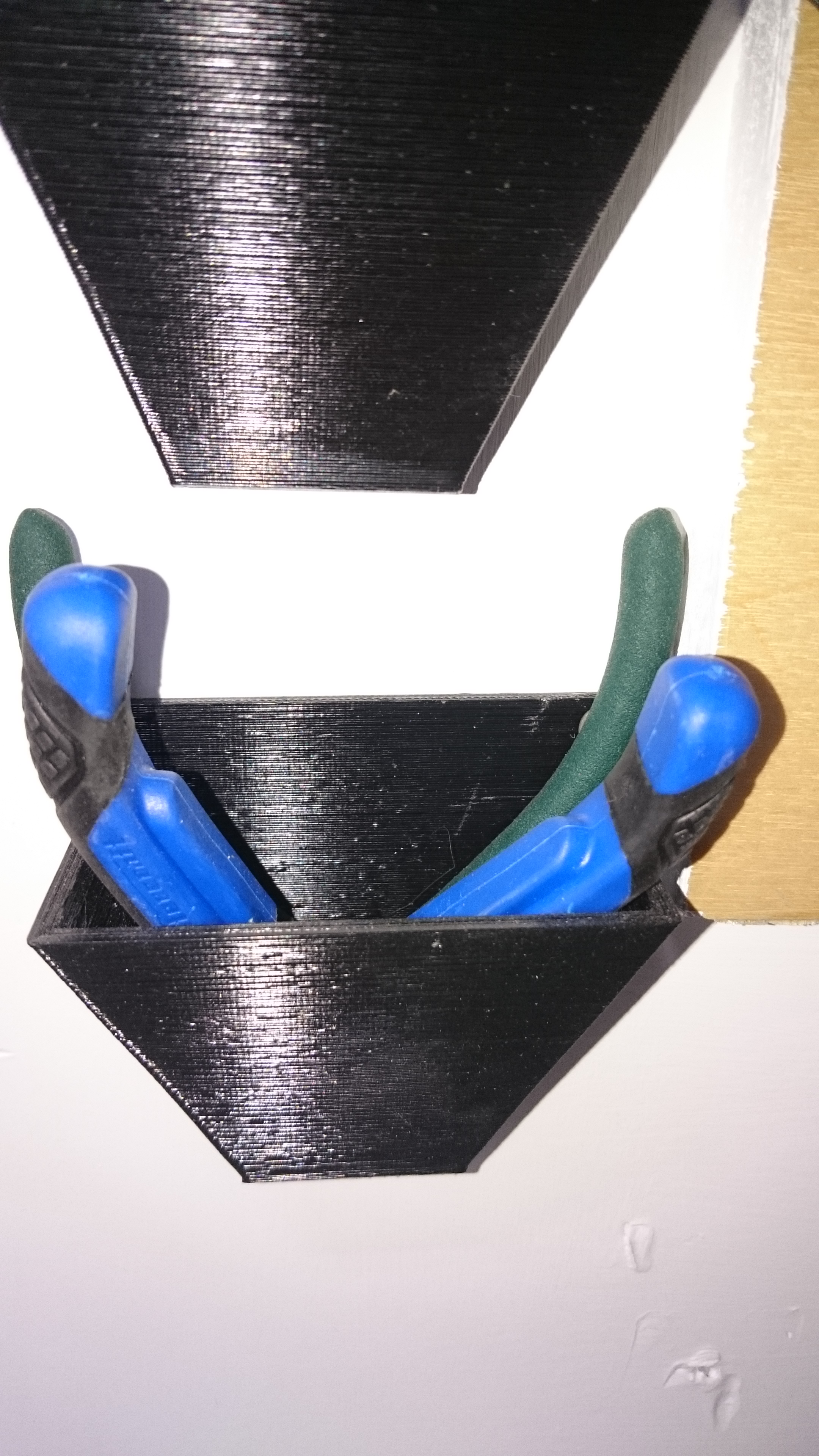 Wall mounted pliers bin
