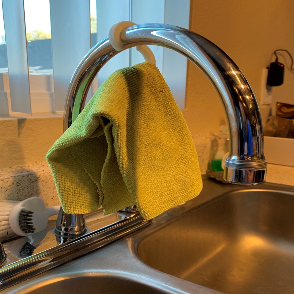 Faucet hook for drying your cleaning cloth