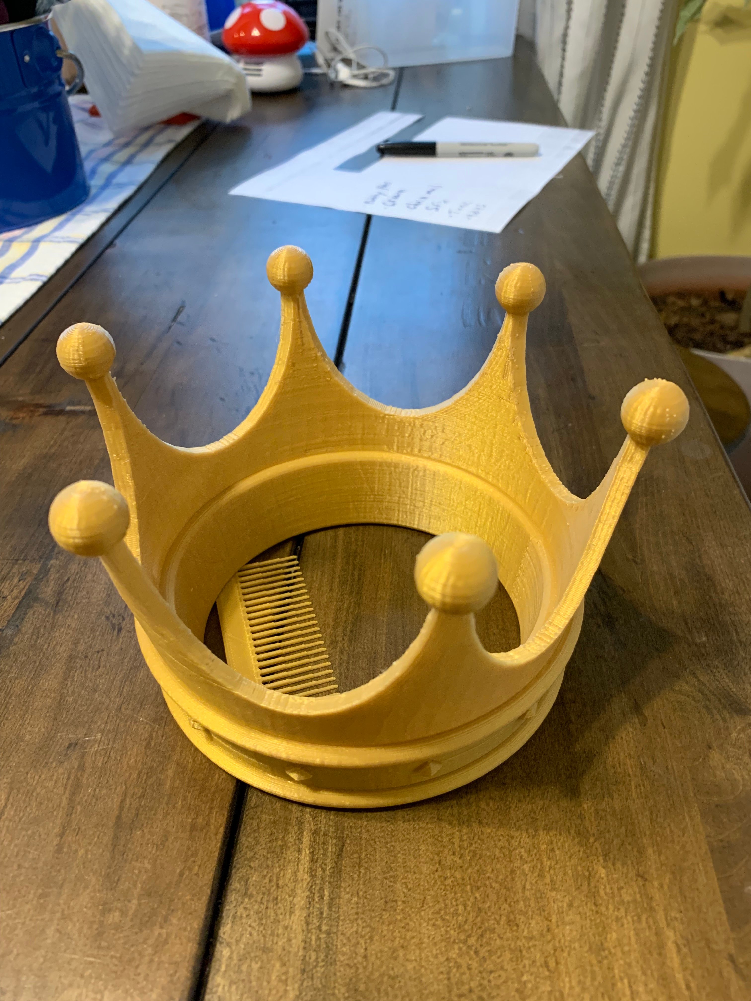 Crown (with built-in comb)