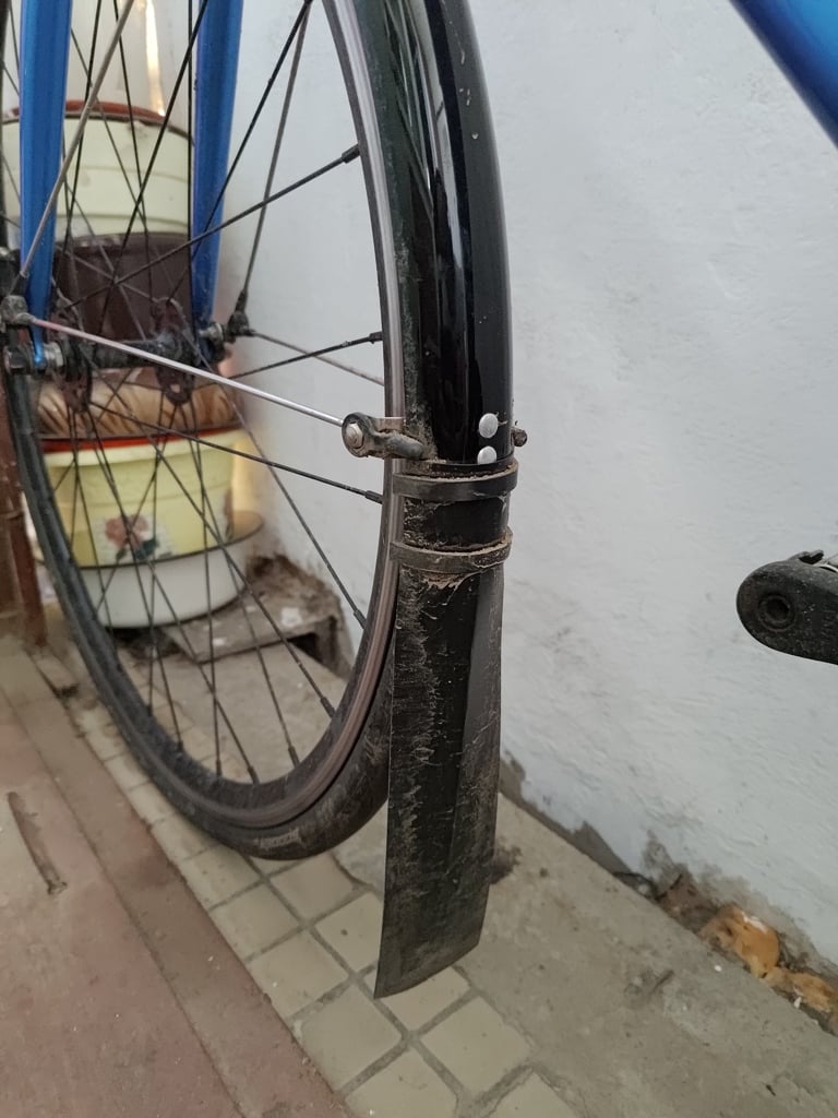 Bike mud flap holder
