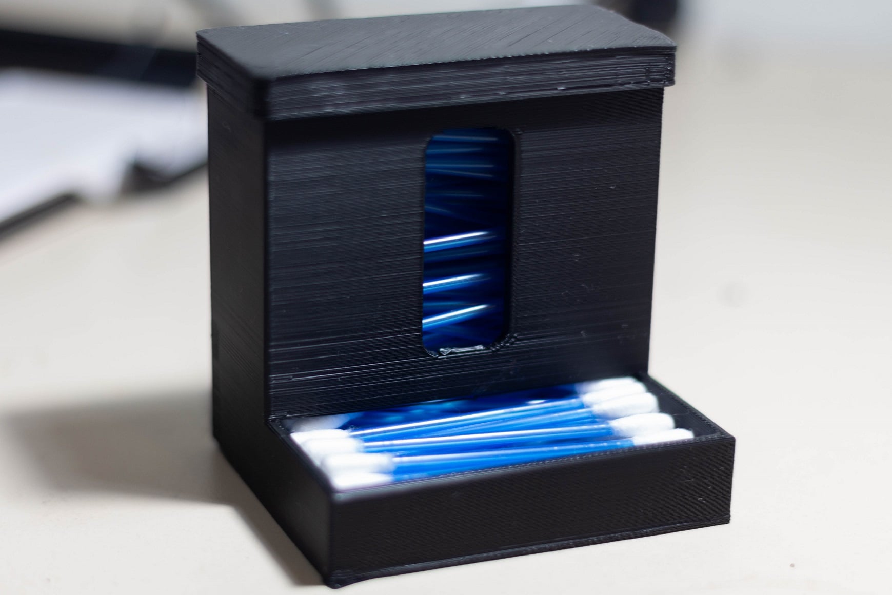 Q-Tip (cotton swab) dispenser