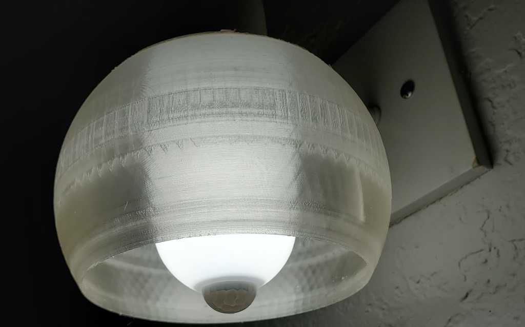 Small spherical half lampshade open for dusk/dawn motion sensor light bulbs