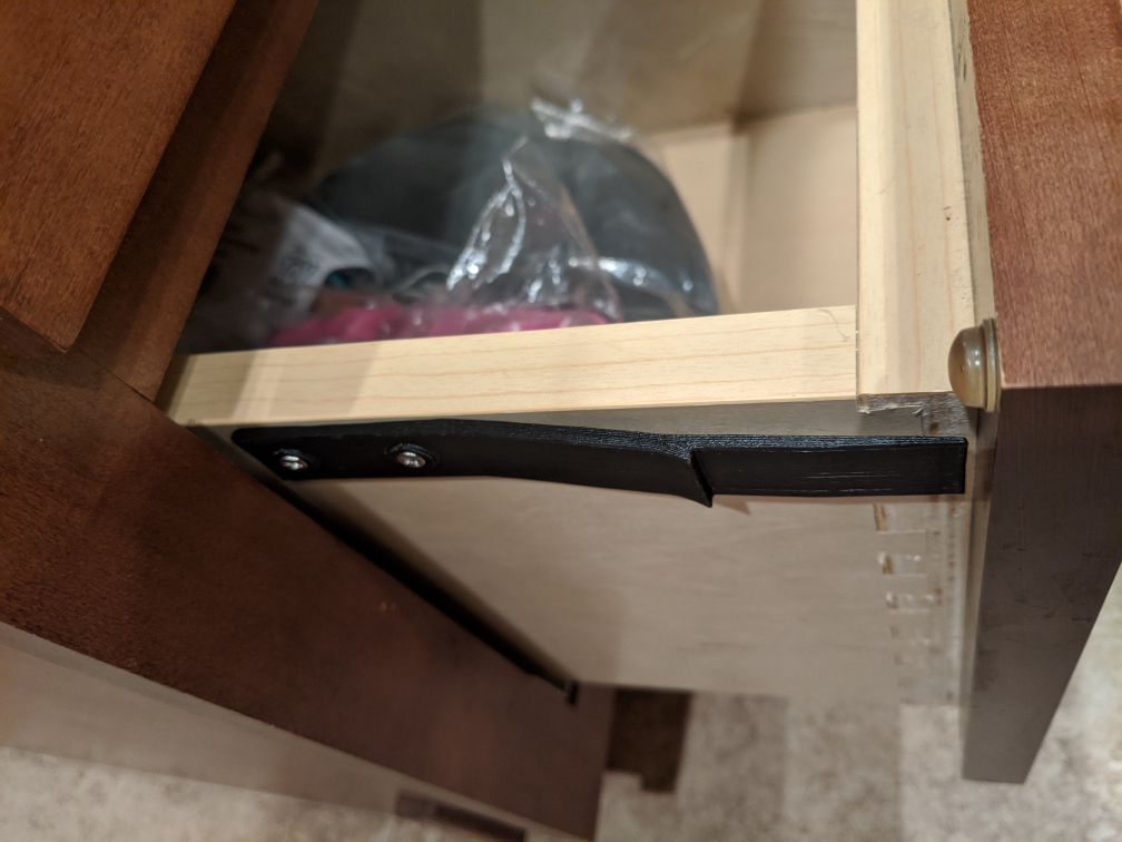 Drawer child side lock