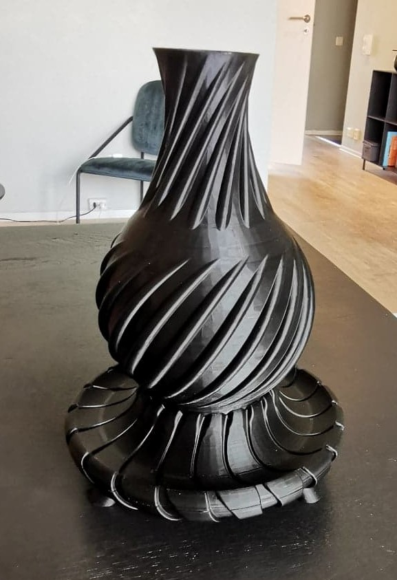 Vase with base and a small hidden compartment