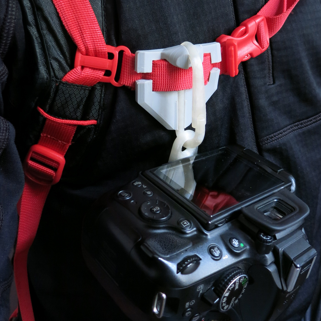 Camera backpack carabiner mount