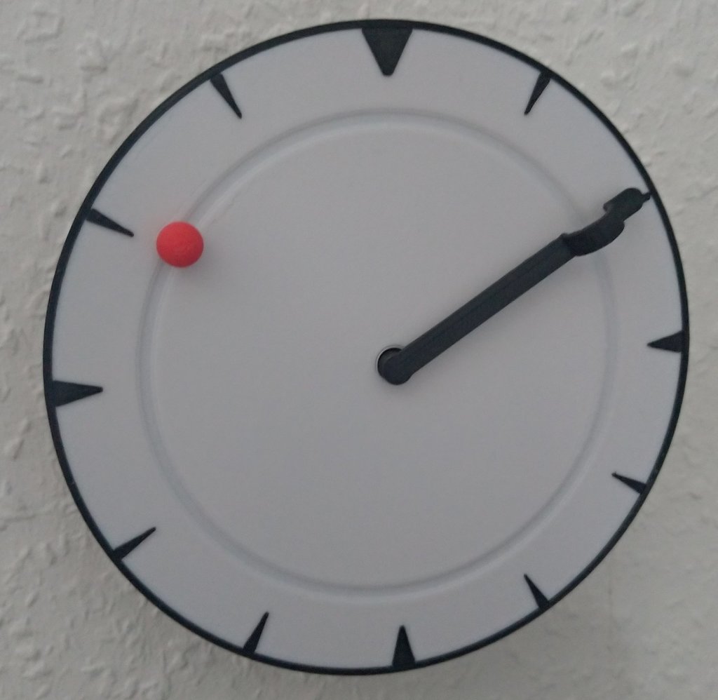 clock with magic / magnetic hour hand
