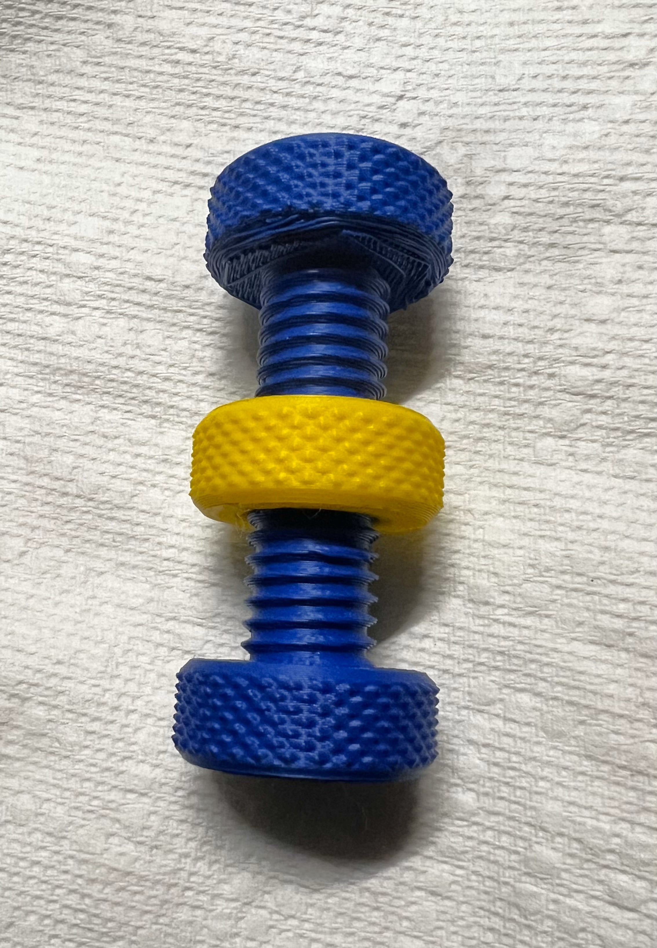 Double-headed knurled fidget bolt