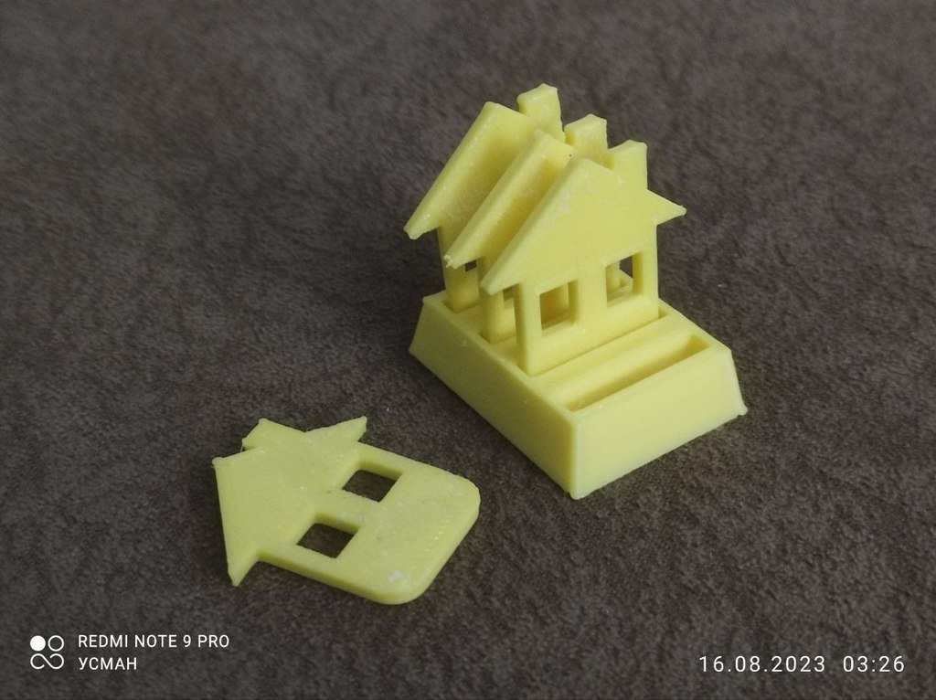 Figurines of houses for monopoly