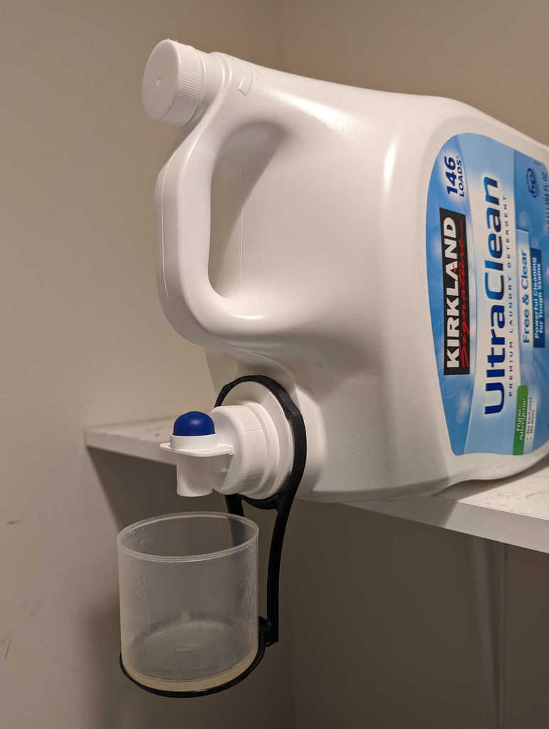 Detergent cup holder (specifically Kirkland UltraClean)