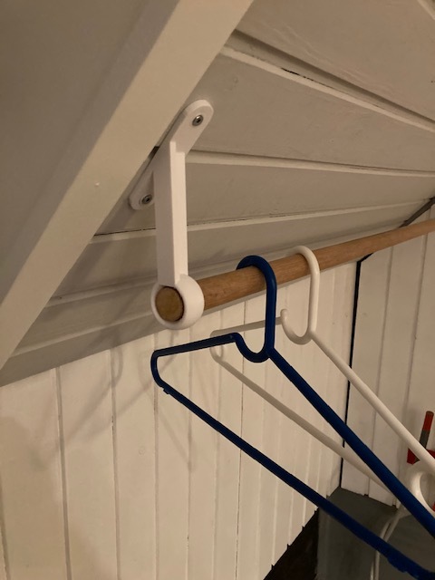 Curtain rod hanger for sloped walls. Openscad