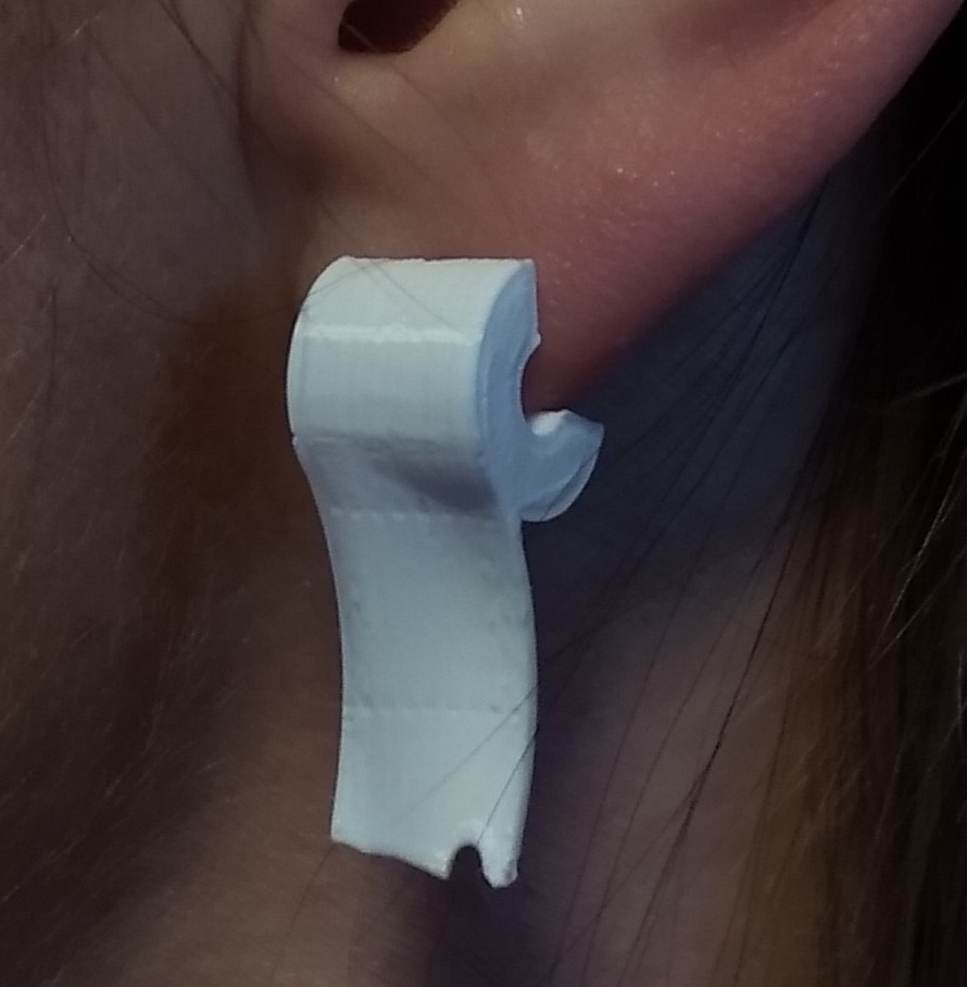 Decadent toilet tissue earring