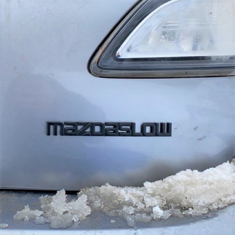 MazdaSlow Car Badge