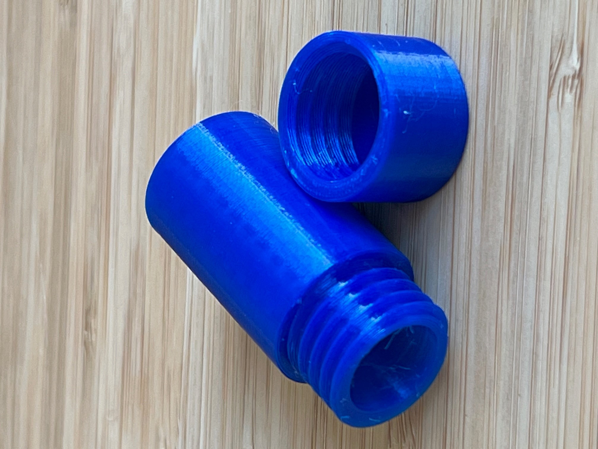 Simple cylindrical container with screw on cap