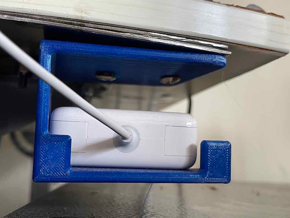 Apple_Laptop_Charger_Under_Desk_Shelf