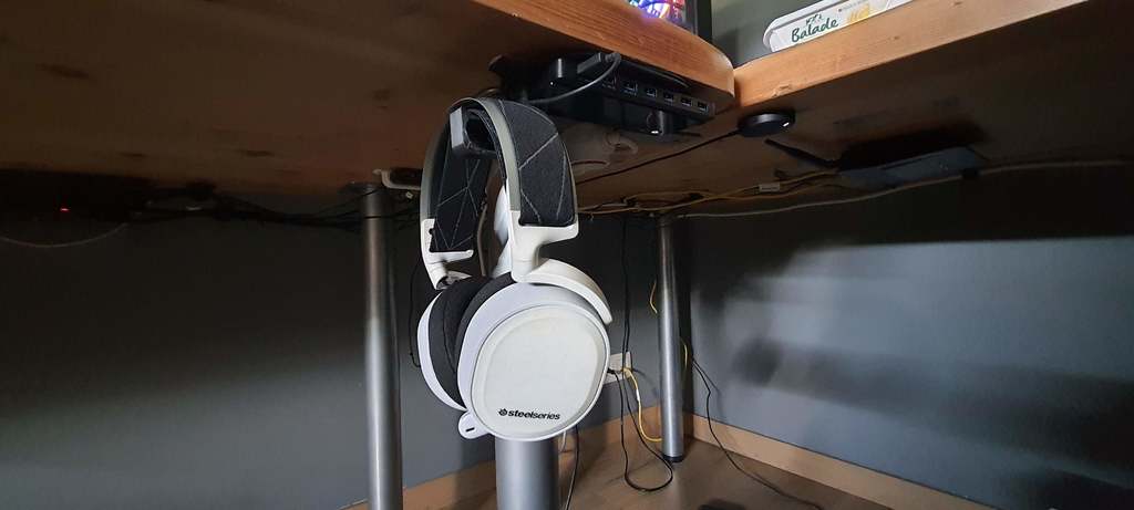 Under desk headset hold