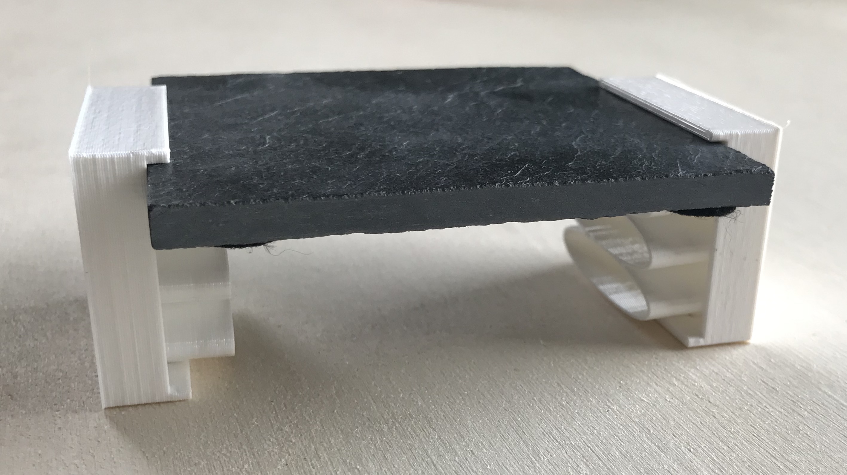 Plate holder for laser engraving slate or the like customizable