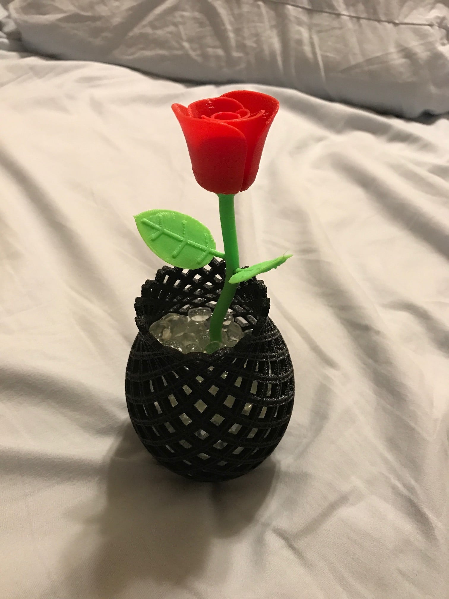 Rose bud, stem, and leaf