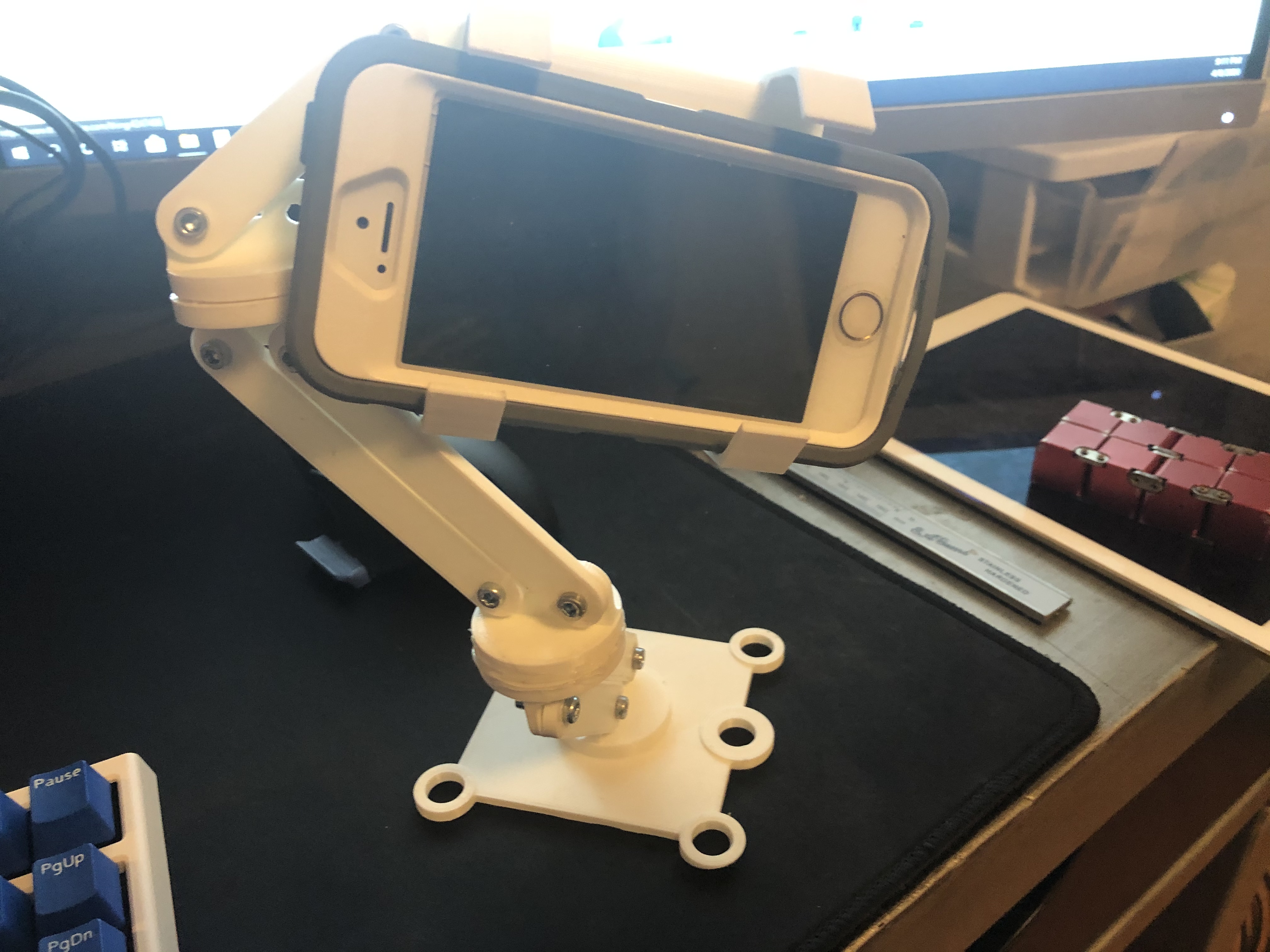 thumb tack phone arm