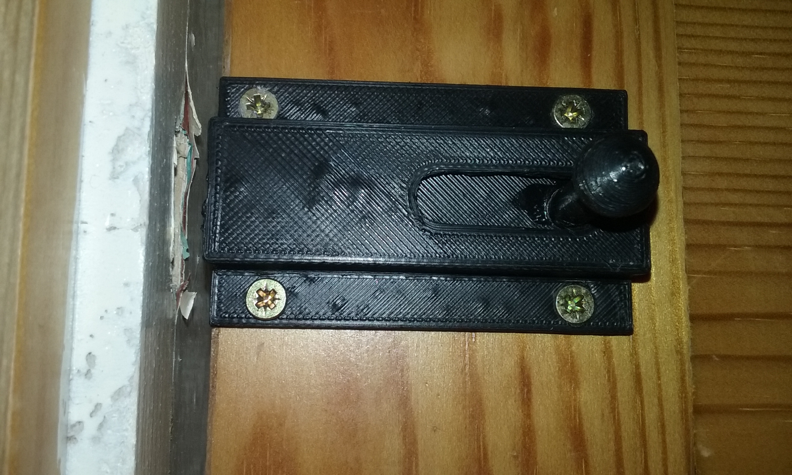 Sliding bolt door lock.