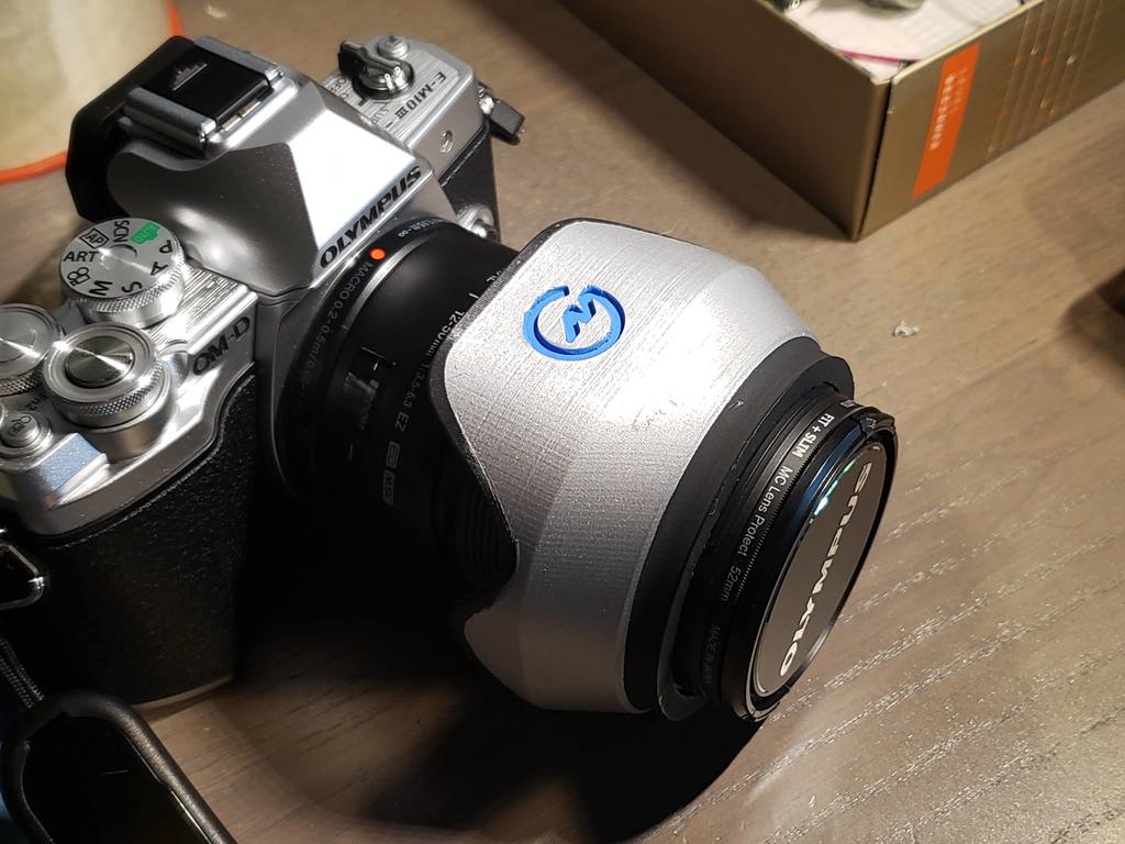 Olympus 12-50mm lens hood