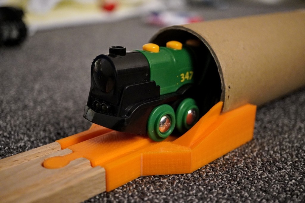 Wooden track to cardboard tube adapter