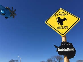 Low Flying Plane Sign