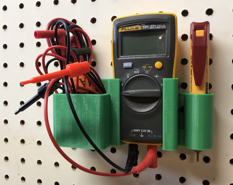 Fluke and tester holder